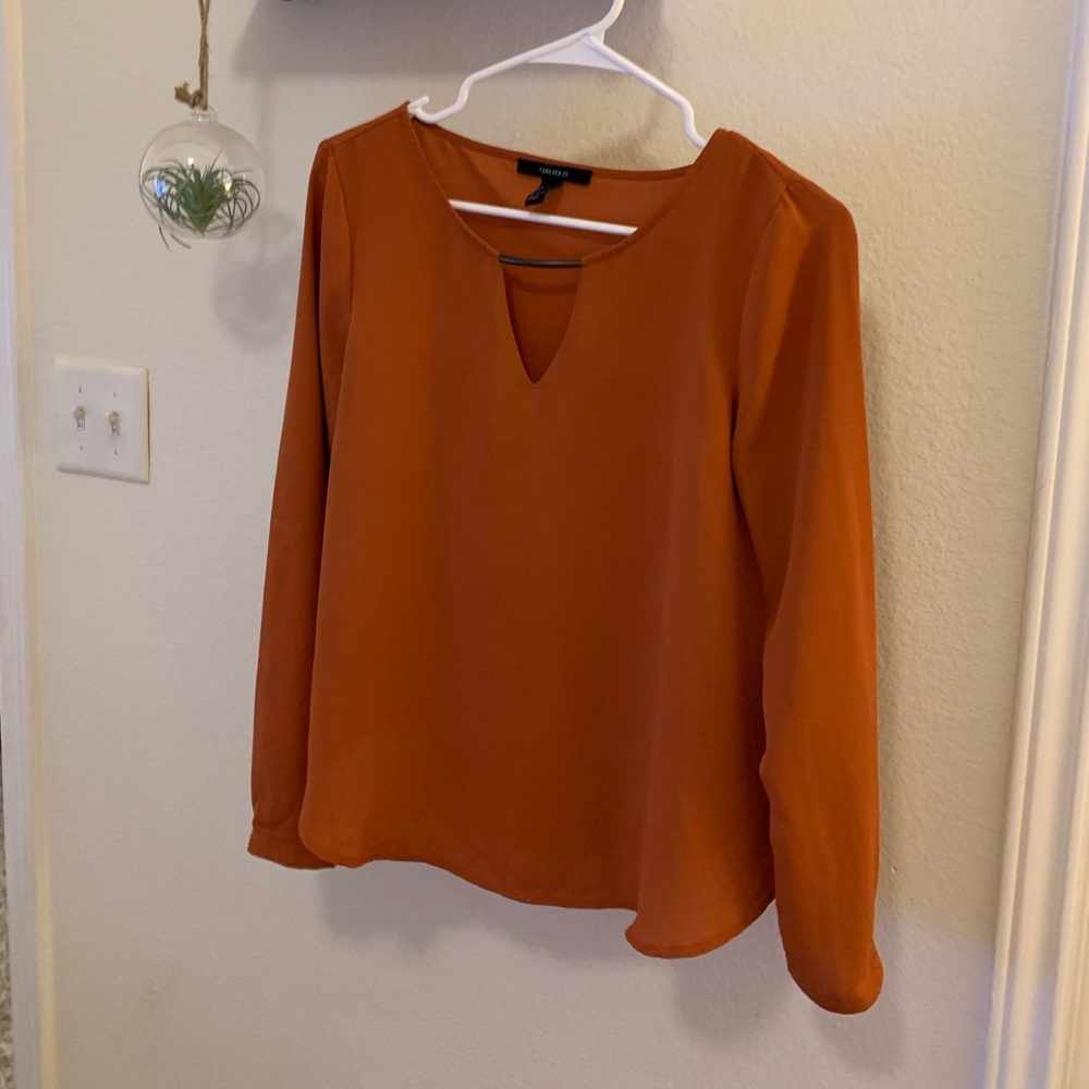 Rust color blouse